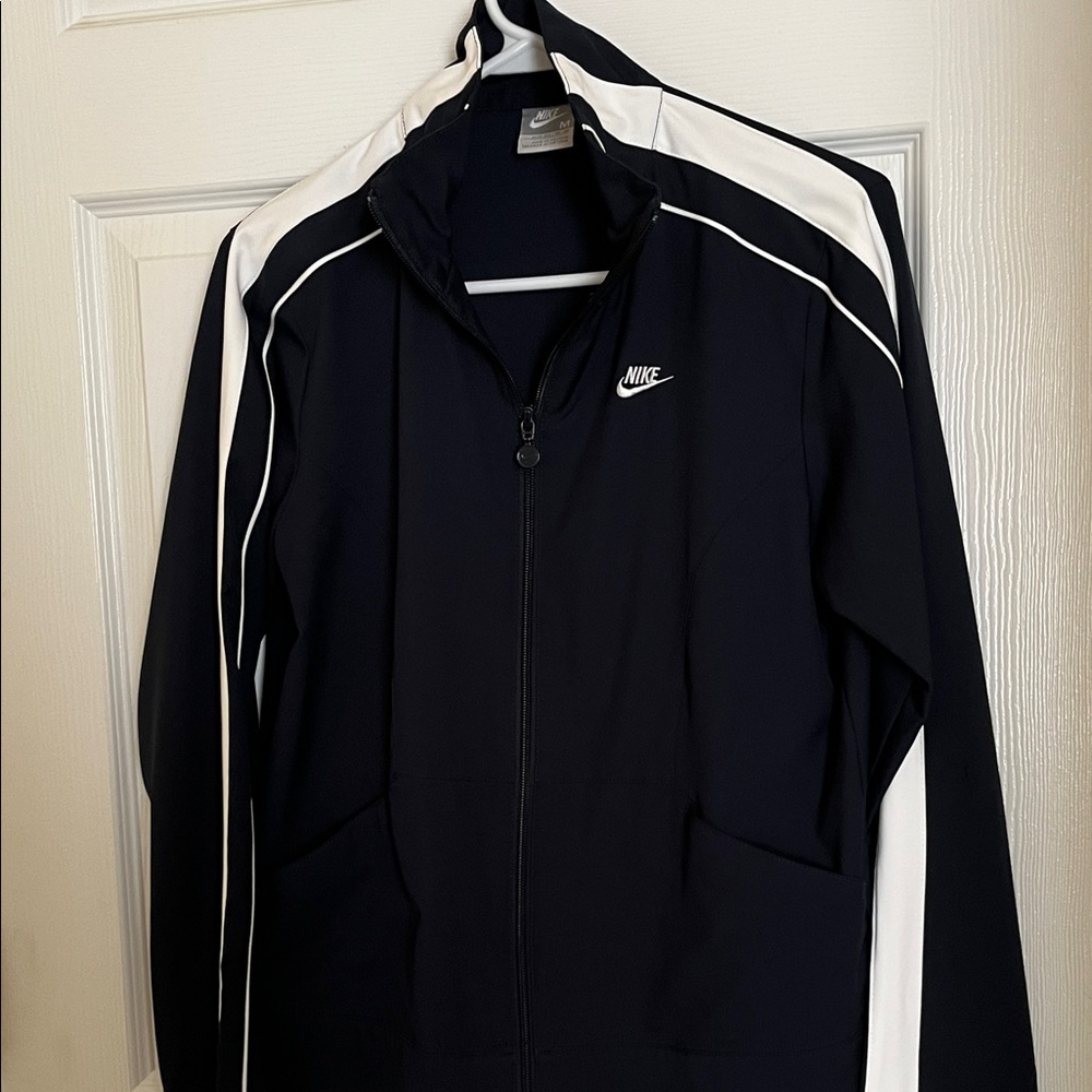 Nike blue and white zip up jacket.